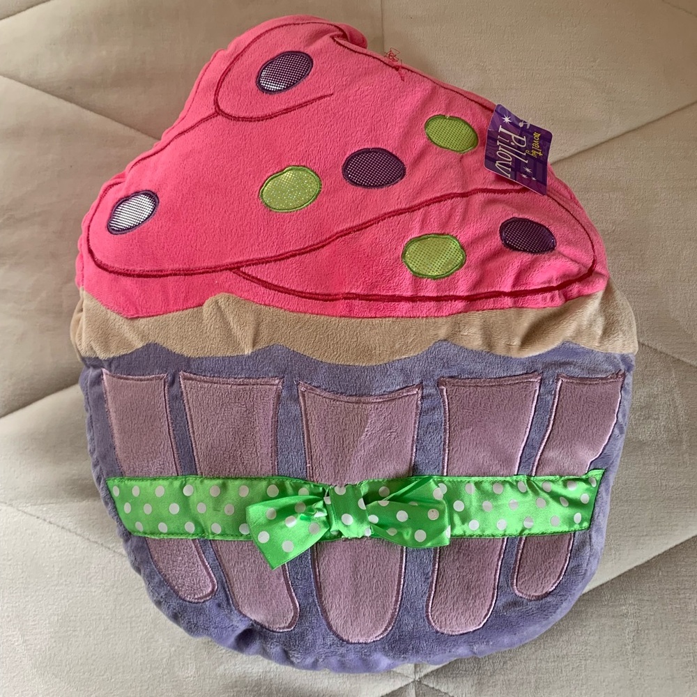 This is a cute cupcake plush pillow.